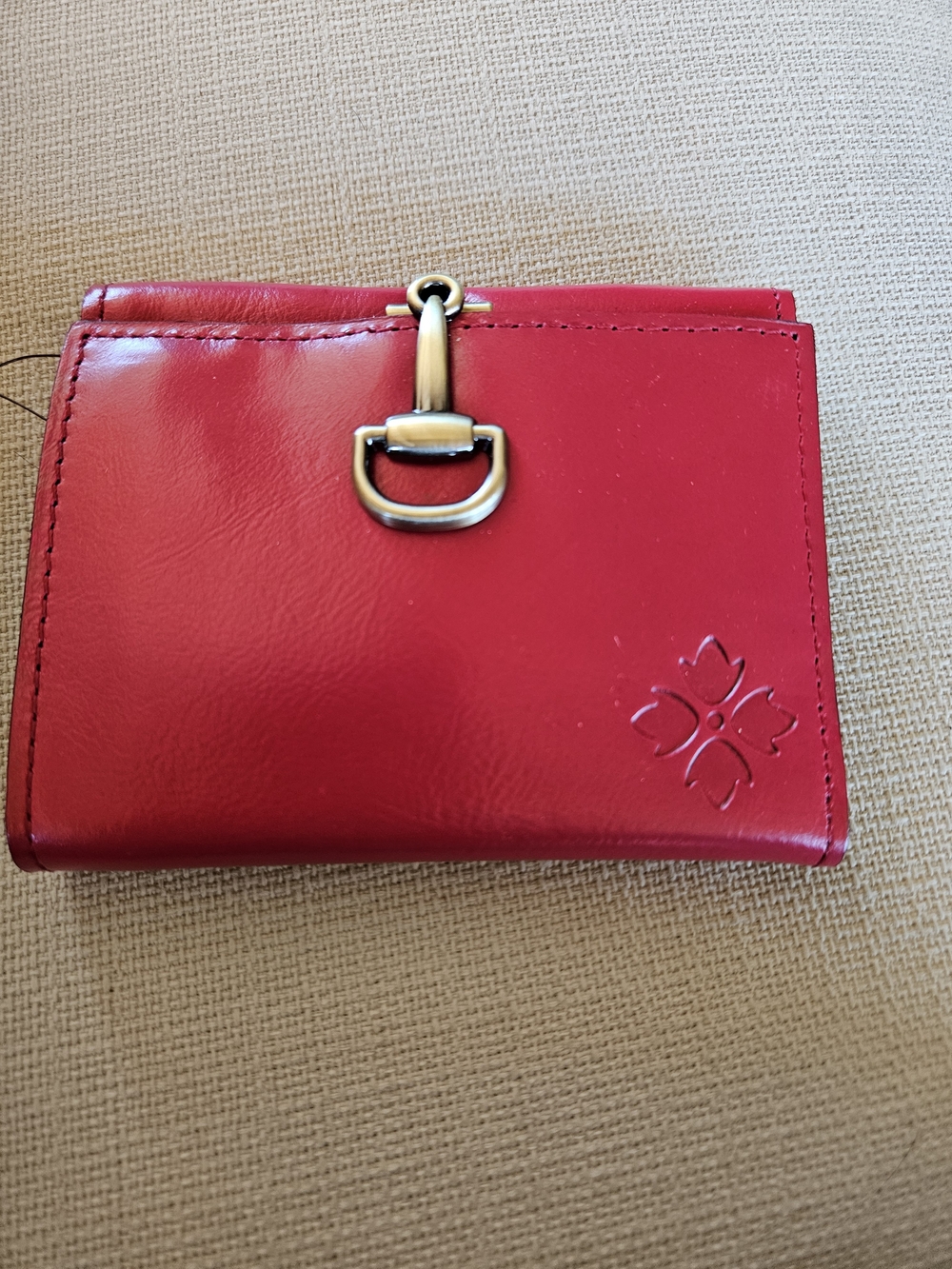 Patricia Nash Strawberry Pink Leather Wallet with Gold Metal Accented Closure.
